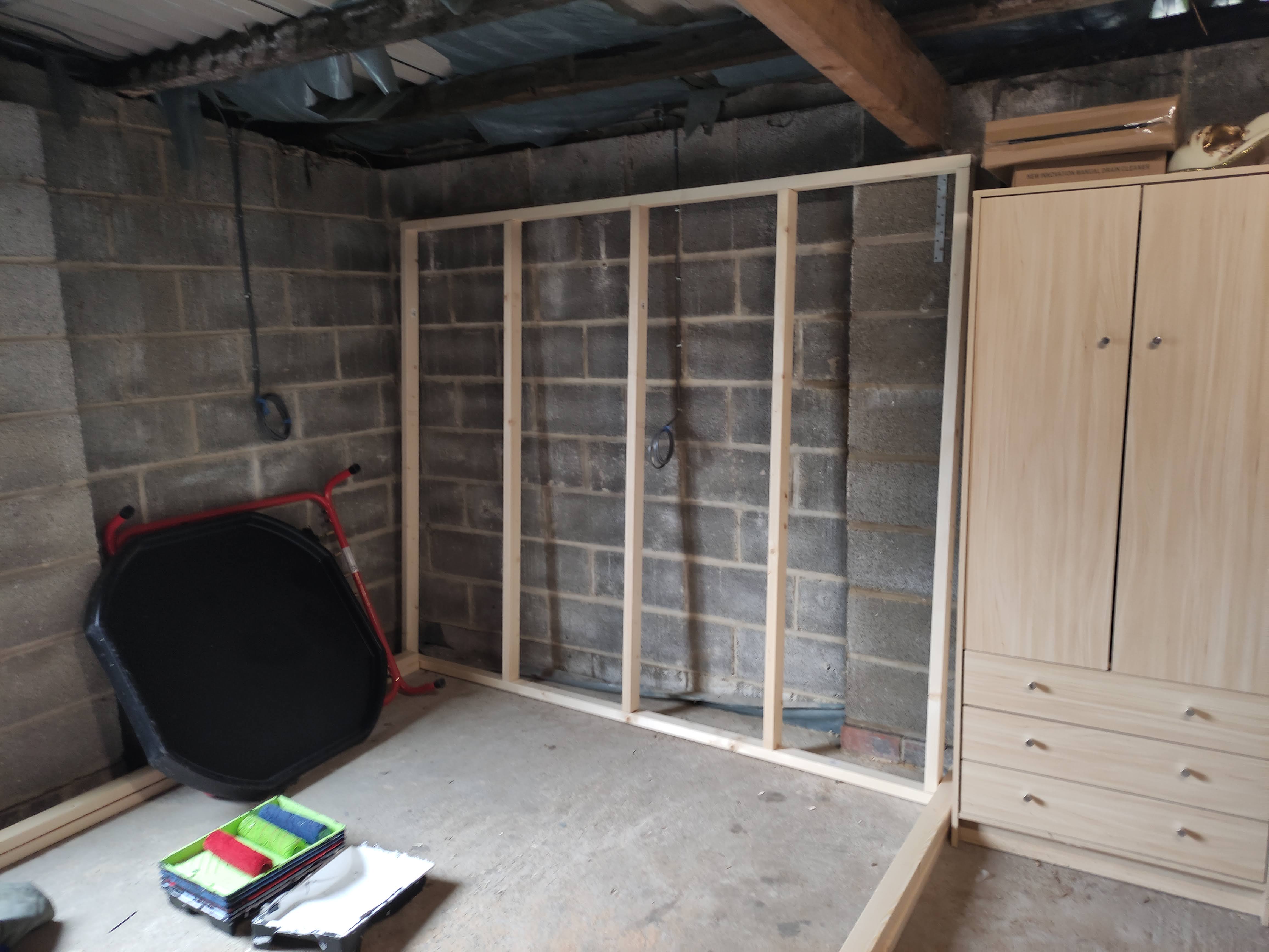 A wood frame with studs but no nogs